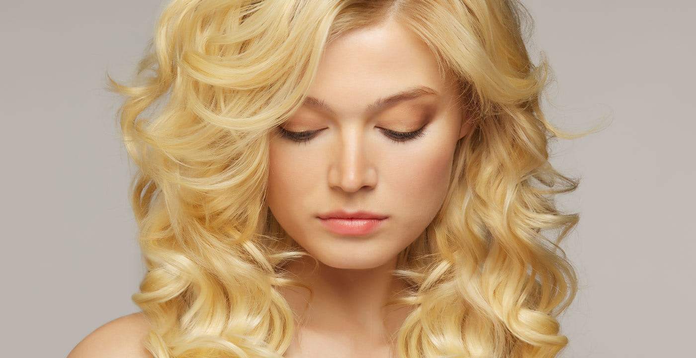 Curly hair 2024 extensions blonde