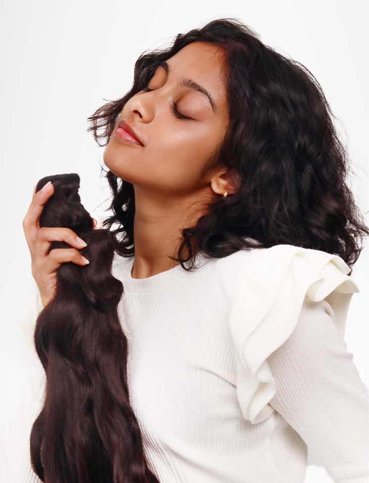 Model Holding Clip-In Extensions