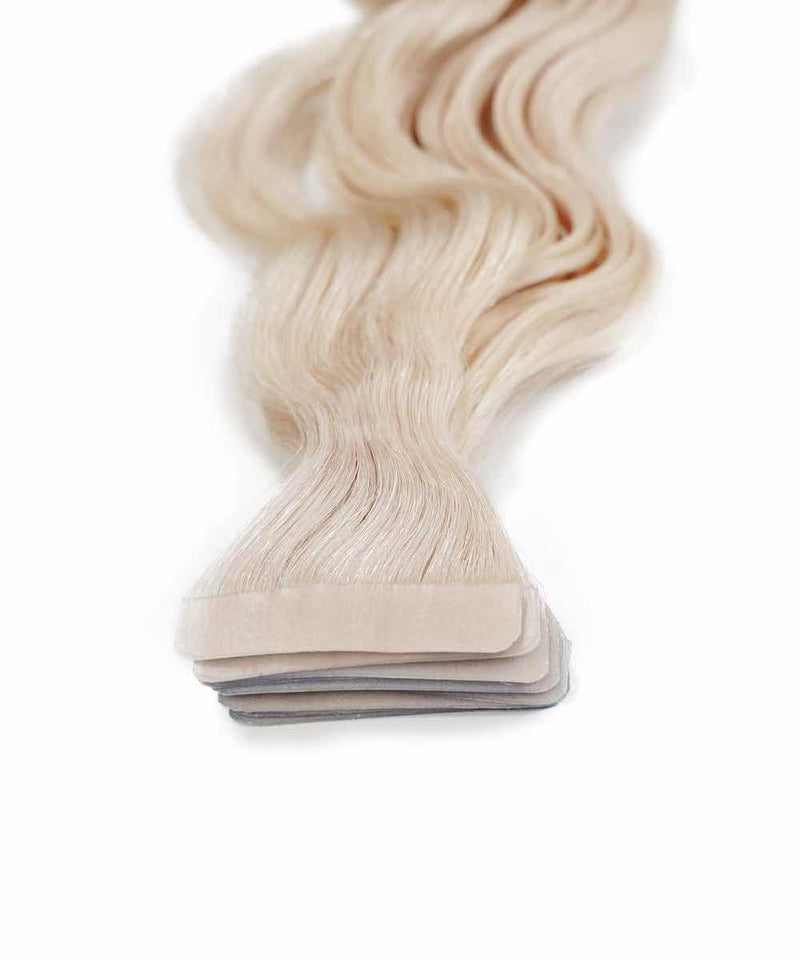 ice blonde (60S) curly tape in hair extensions by Perfect Locks#color_ice-blonde-(60S)